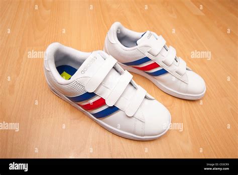 Adidas trainers with Velcro fastening